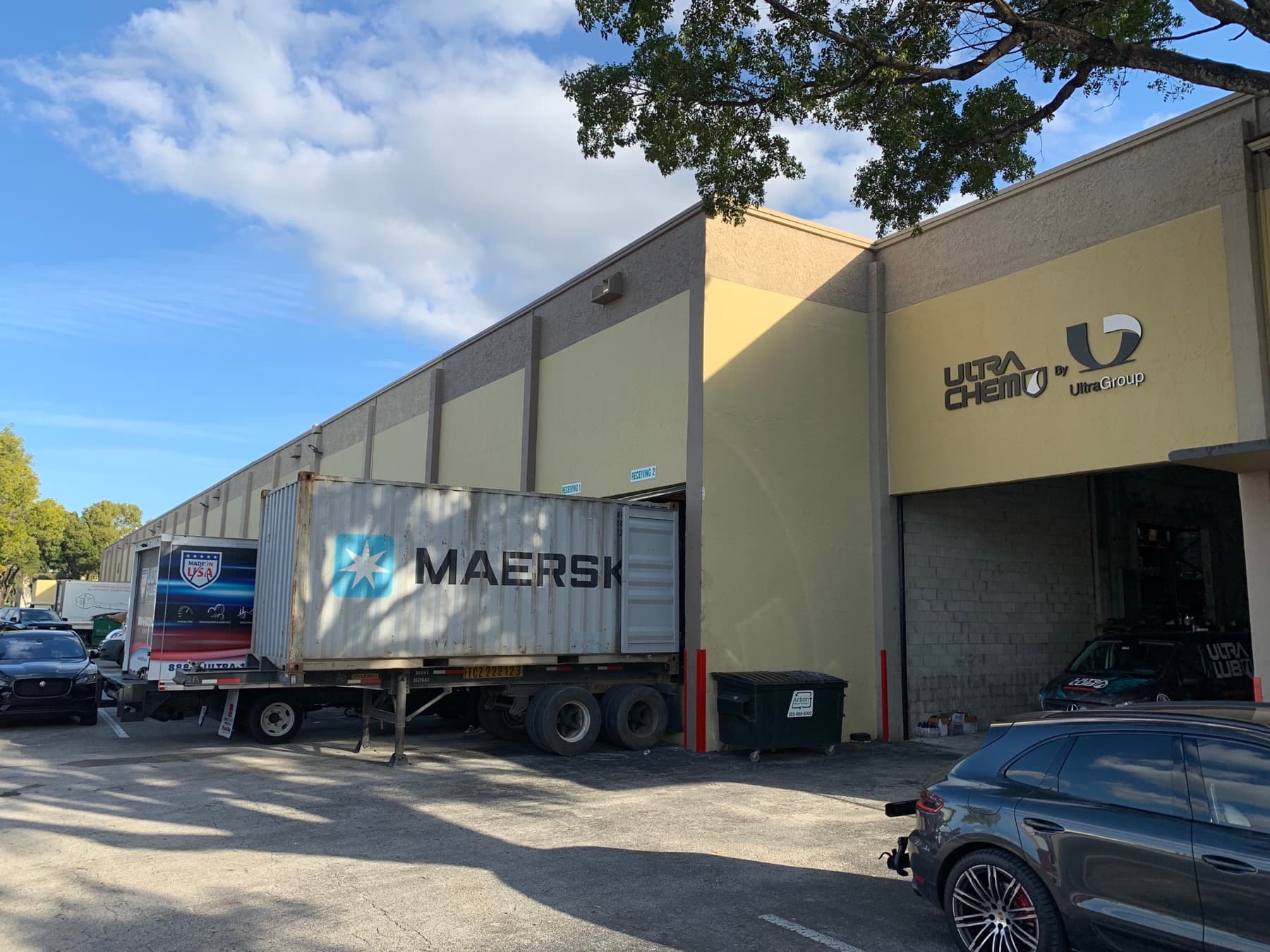 Doral distribution center exterior with receiving bays and freight container